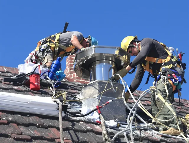 Protective chimney cap installed by Killingly Chimney Sweep in Killingly, CT