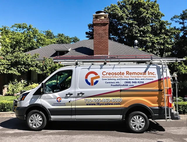 Killingly Chimney Sweep technician removing creosote safely in Killingly, CT