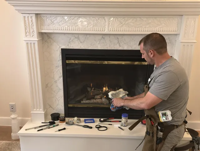 Killingly Chimney Sweep performing fireplace maintenance in Killingly, CT